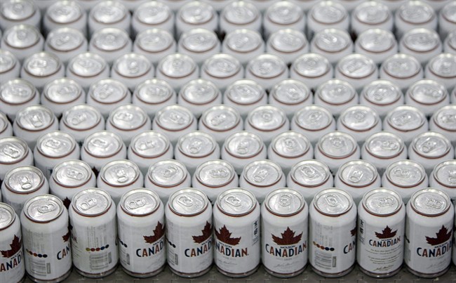 Cans of Molson Canadian beer are shown on the can line at Molson Breweries in Vancouver, Tuesday, Jan. 26, 2010. Beer is still the drink of choice for many Canadians who consume alcoholic beverages, in volume and dollar value.