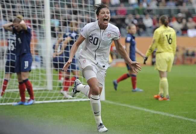 File photo - United States' Abby Wambach celebrates scoring her side's 2nd goal during the semifinal match between France and the United States at the Women’s Soccer World Cup in Moenchengladbach, Germany, Wednesday, July 13, 2011.
