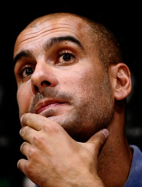 FC Barcelona's coach Pep Guardiola attends a conference at the Grimaldi Forum in Monaco, Thursday, Aug. 25, 2011. Guardiola is poised to become the most successful coach in Barcelona's history. A victory in Friday's European Super Cup for his Champions League-winning side over Europa League winner FC Porto would give Guardiola his 12th trophy in just his fourth season with Barca. (AP Photo/Manu Fernandez).