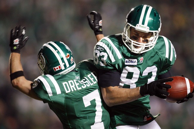 Saskatchewan Roughriders Andy Fantuz, right, celebrates his touchdown with Weston Dressler during overtime CFL Western semi-final football action in Regina, Sask., Sunday, Nov. 14, 2010. Fantuz is returning to the Saskatchewan Roughriders.The all-star slotback tweeted this morning that he will be at the CFL team's practice today, effectively putting his NFL aspirations on hold.THE CANADIAN PRESS/Jeff McIntosh.