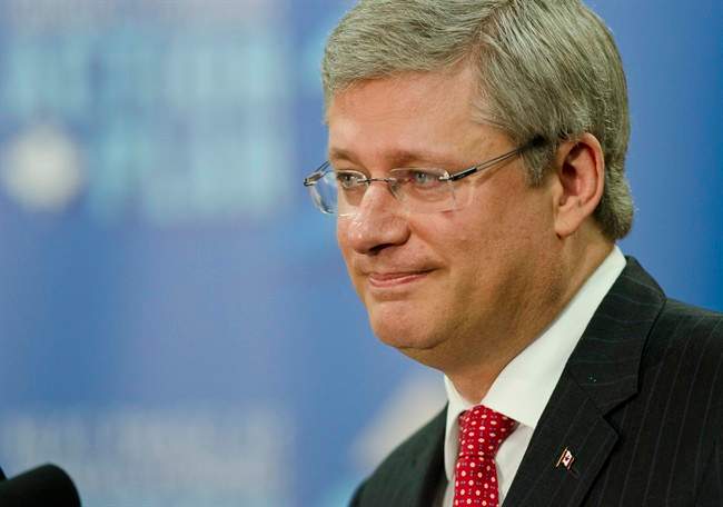 Prime Minister Stephen Harper takes questions from reporters after visiting the Vaccine and Infectious Disease Organization (VIDO) at the University of Saskatchewan on Friday September 16, 2011 in Saskatoon, Saskatchewan. THE CANADIAN PRESS/Derek Mortensen.