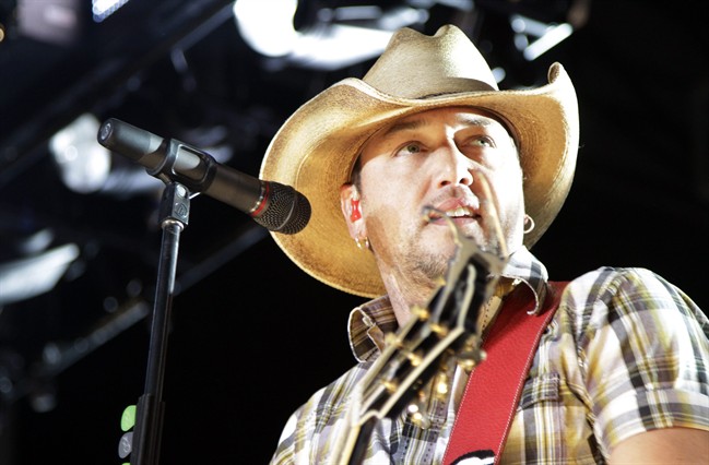 FILE - In this July 27, 2011 file photo, country music artist Jason Aldean performs in Paso Robles, Calif. Aldean and Blake Shelton are nominated for five Country Music Associaton Awards, including the night's top prize, entertainer of the year. The awards will be held on Nov. 9, in Nashville, Tenn. (AP Photo/Michael A. Mariant, file)
