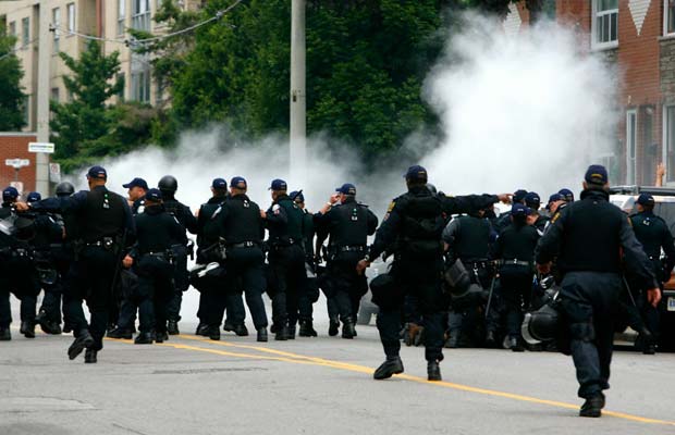 Police patrol a Toronto street during the G20. 