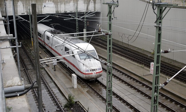 An ICE high speed train enters the northern exit of Berlin's central train station tunnel in Berlin(AP Photo/Michael Sohn).