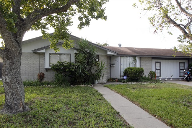 There was little activity Tuesday, Oct. 11, 2011 at a home once owned by Mansour Arbabsiar on West Manor Drive in Corpus Christi. Nueces County records show that he and his wife bought the home in 1994. A notice of foreclosure sale showed the same property was to be sold in a public auction to the highest bidder last year. (AP Photo/Michael Zamora/Caller-Times).