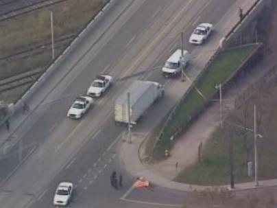 Cyclist dead after being struck by a vehicle in west-end Toronto - image