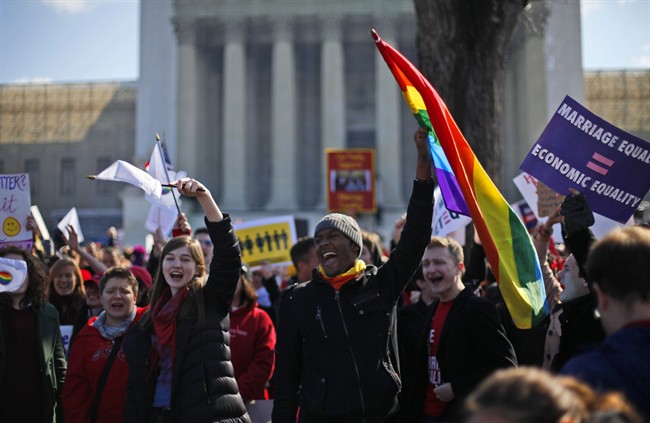 Demonstrators chant outside the Supreme Court in Washington, March 26, 2013. 
