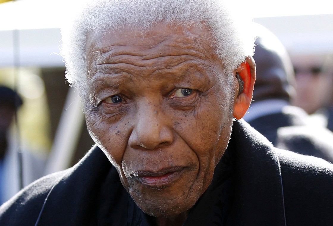 FILE - In this June 17, 2010 file photo, former South African President Nelson Mandela leaves the chapel after attending the funeral of his great-granddaughter Zenani Mandela in Johannesburg, South Africa. 
