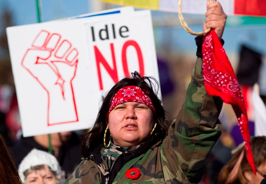 Idle No More protesters demonstrate at the base of the Ambassador Bridge in Windsor Ontario, Wednesday, January 16, 2013. About 1000 demonstrators disrupted traffic to the country's busiest border crossing for several hours. 