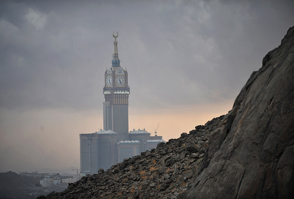 The Abraj Al-Bait Towers also known as the Mecca Royal Hotel Clock Tower, is seen from Jabal al-Noor or ‘Mountain of Light’ overlooking the holy city of Mecca on October 21, 2012