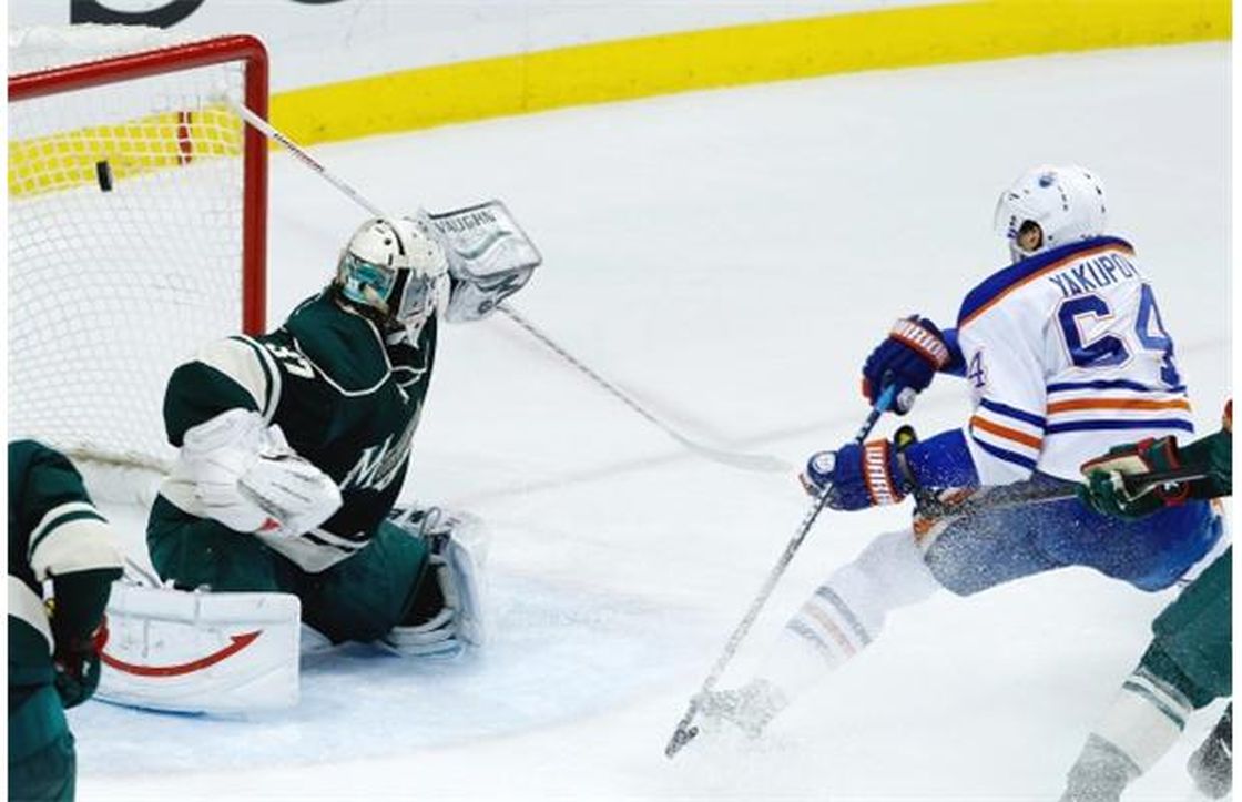 Edmonton Oilers right wing Nail Yakupov scores on Minnesota Wild goalie Josh Harding during the second period of NHL action in St. Paul, Minn., Friday, April 26, 2013.