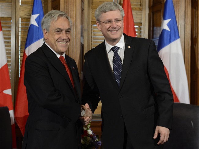 Canadian Prime Minister Stephen Harper meets with Chilean President Sebastian Pinera in his office, Thursday May 30, 2013 on Parliament Hill in Ottawa.