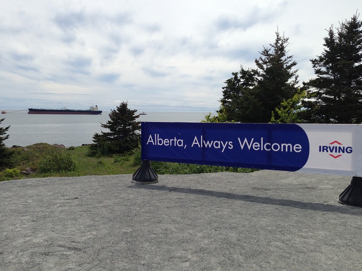 An Irving Oil sign at a supertanker terminal, the last stop on Redford’s tour of Saint John.