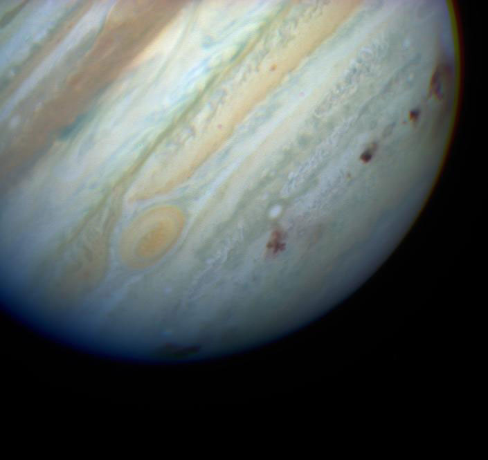 Comet Shoemaker-Levy 9 was torn apart by Jupiter’s massive gravity. The pieces collided with the planet, leaving dark scars in its cloud tops.