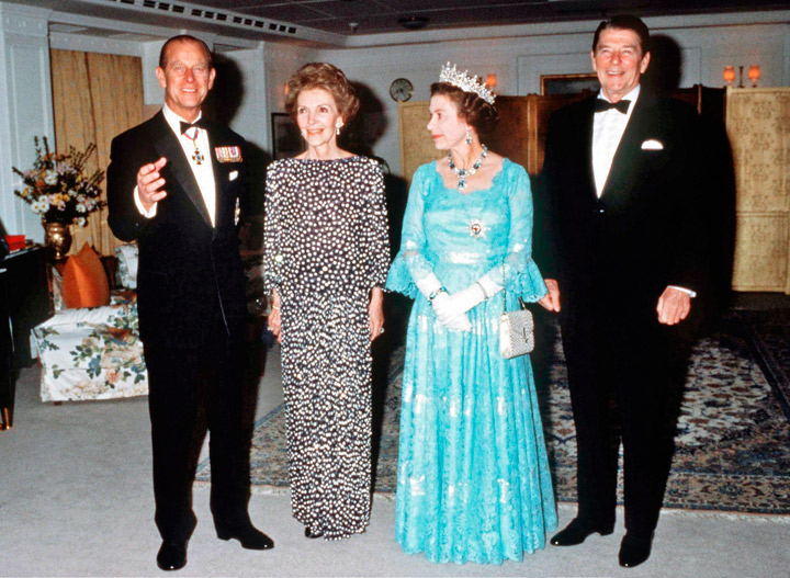 Queen Elizabeth II and Prince Phillip the Duke of Edinburgh on Britannia with US President Ronald Reagan and his wife Nancy Reagan in 1983. (Photo credit: Getty Images)