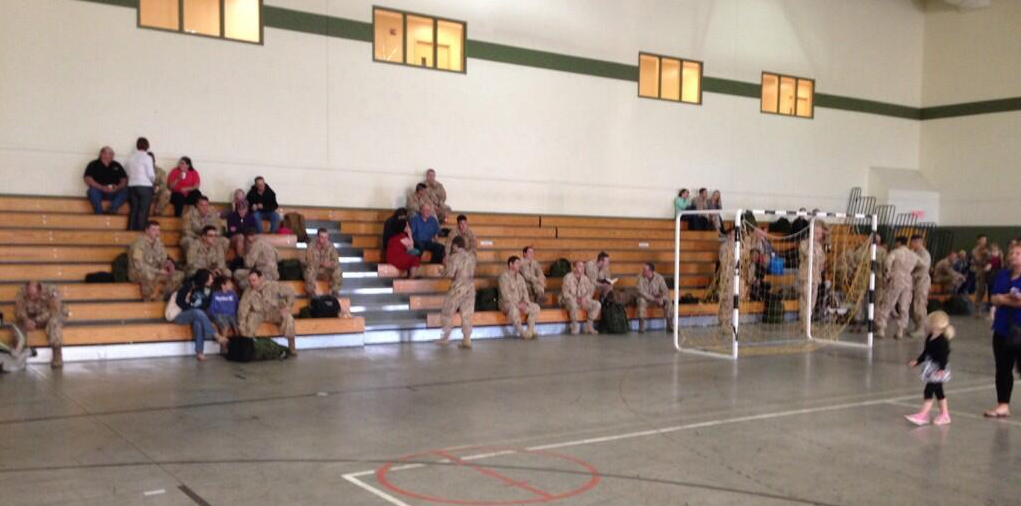Families gather at CFB Shilo to say farewell to soldiers departing for Afghanistan on Monday.