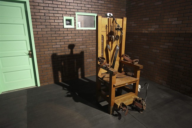 This photo taken May 16, 2013, shows an electric chair on exhibit at the Texas Prison Museum in Huntsville, Texas. 