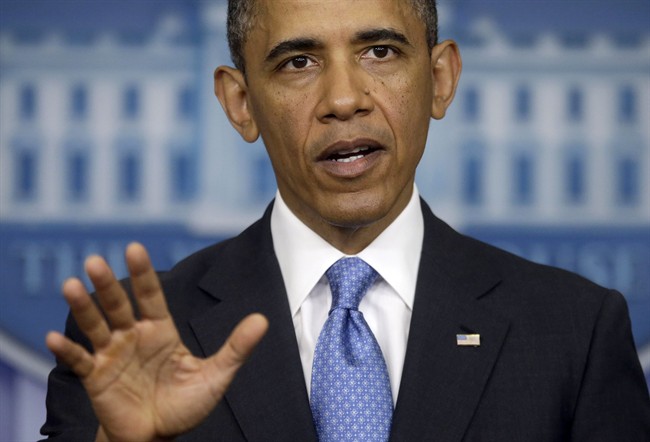 In this April 30, 2013, file photo, President Barack Obama answers questions during his new conference in the Brady Press Briefing Room of the White House in Washington, Tuesday, April 30, 2013. U.S. officials said June 13, 2013, that the Obama administration has concluded that Syrian President Bashar Assad's regime has used chemical weapons against the opposition seeking to overthrow him, crossing what Obama called a 'red line'. 