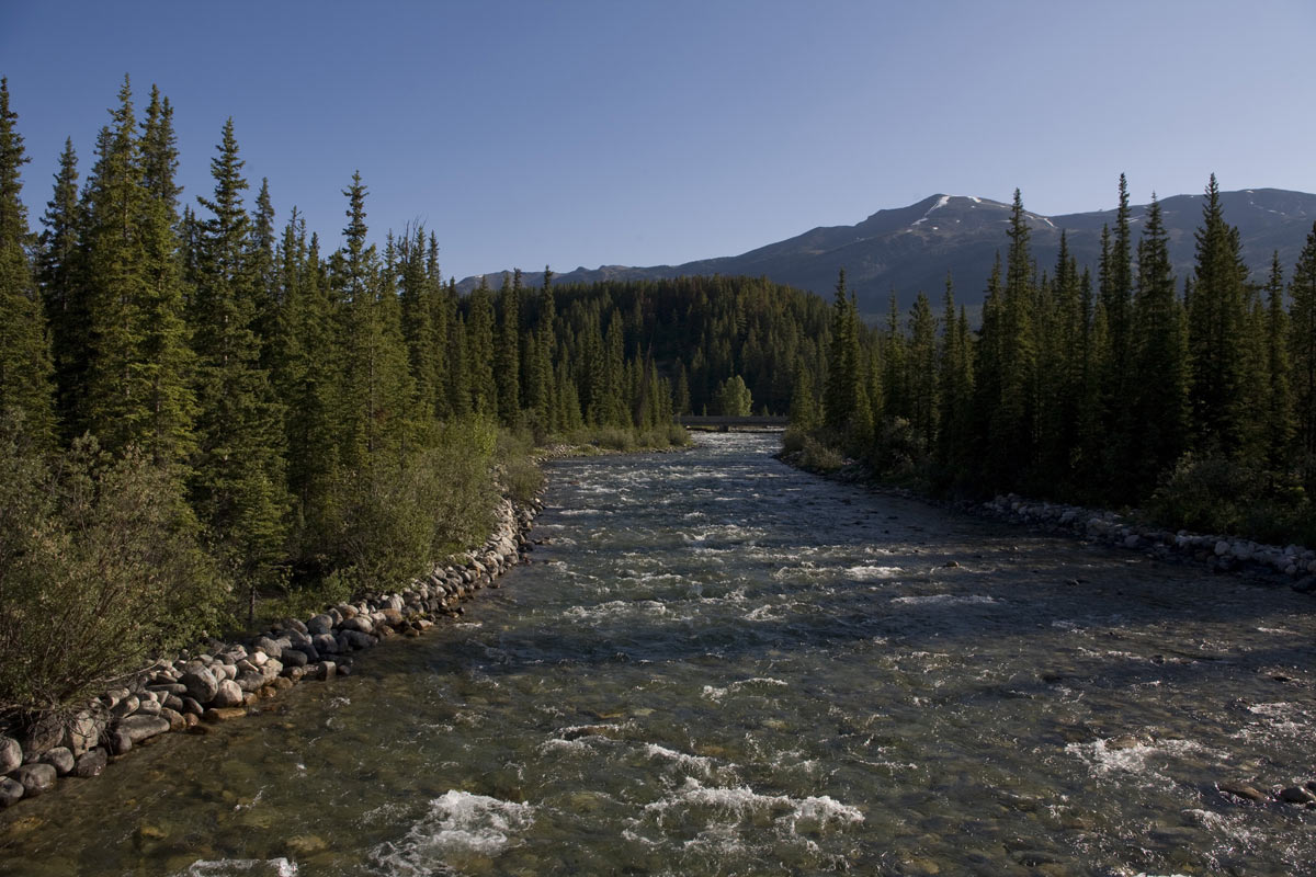 The Bow River flows through the valley as seen in this 2009 Lake Louise, Canada summer morning photo.