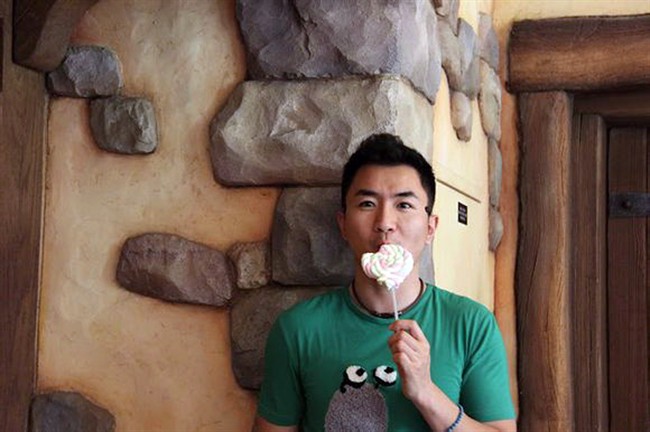 Jun Lin poses in this undated family handout photo.