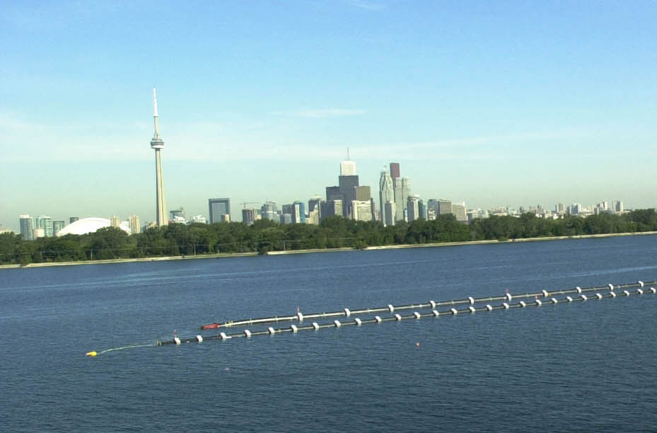 The final section of EnWave’s Deep Lake Water Cooling pipe is ready to be placed under water in this photo from August 2003.
