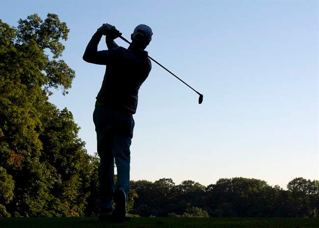 File photo: Graham DeLaet of Weyburn, Sask., tees off on the 11th hole during the first round at the Canadian Open Golf Championship at Glen Abbey in Oakville, Ont., on Thursday, July 25, 2013.
