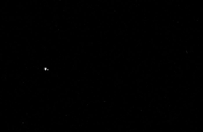 Earth, the brightest of the two, and the moon, as seen from Mercury.