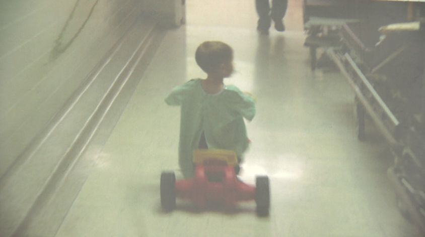 Edmonton boy not letting losing eye to cancer slow him down on the ice - image