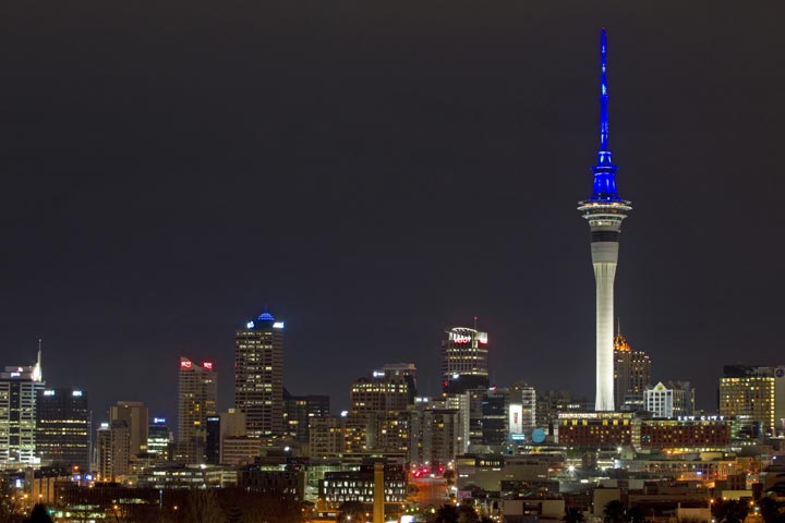 The Sky Tower lit up blue in Auckland, New Zealand.