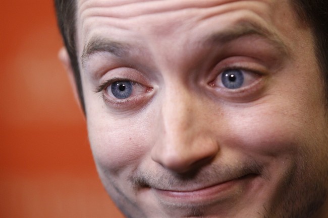  In this Friday, Jan. 20, 2012 file photo, actor Elijah Wood is interviewed at the 2012 Sundance Film Festival in Park City, Utah. 
