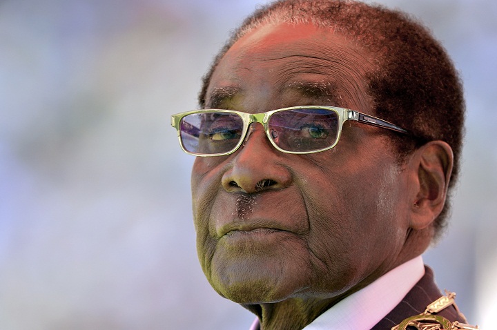 Zimbabwean President Robert Mugabe looks on during his inauguration and swearing-in ceremony on August 22, 2013 at the 60,000-seater sports stadium in Harare.
