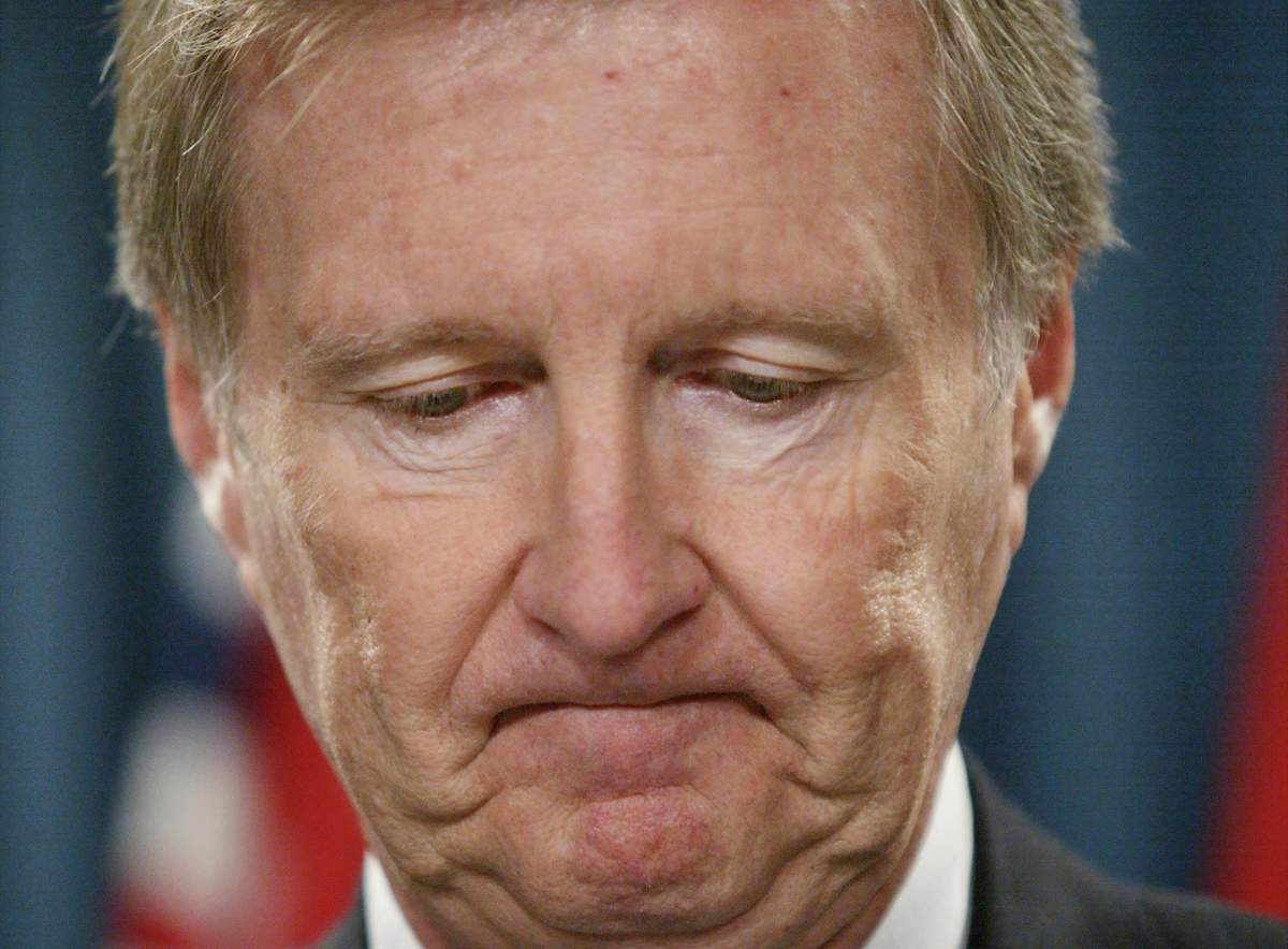  Bob Runciman frowns during a news conference on Parliament Hill , January 3, 2003, in Ottawa.
