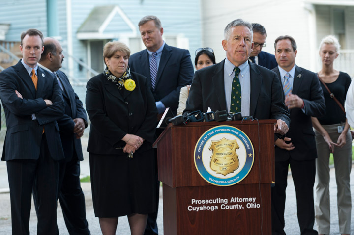 Summit County Prosecutor Tim McGinty addresses press on August 7, 2013 in front of the home of Ariel Castro in Cleveland, Ohio. (Photo credit: Getty Images)