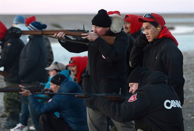 Harper goes target shooting with Canadian Rangers in Arctic - image