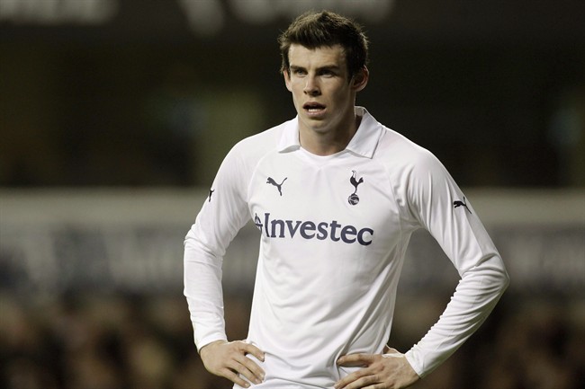 In this Wednesday, March 7, 2012 file photo, Tottenham Hotspur's Gareth Bale reacts during their English FA Cup fifth round replay soccer match against Stevenage at White Hart Lane, London.(AP Photo/Sang Tan, File).