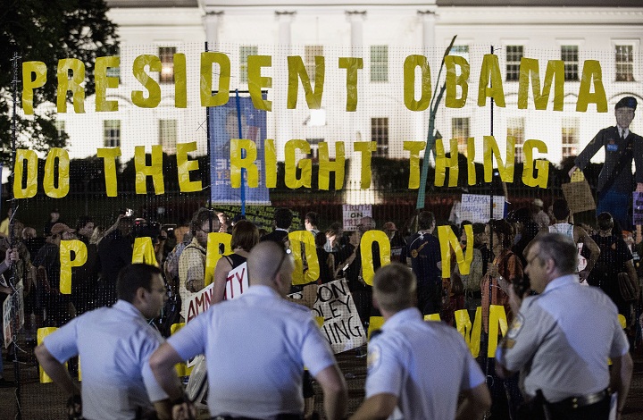 WASHINGTON, DC - AUGUST 21: Protesters demonstrate in support of Bradley Manning on August 21, 2013 in front of the White House in Washington, DC. Manning was sentenced to 35 years in prison for leaking hundreds of thousands of classified documents to the anti-secrecy group WikiLeaks.