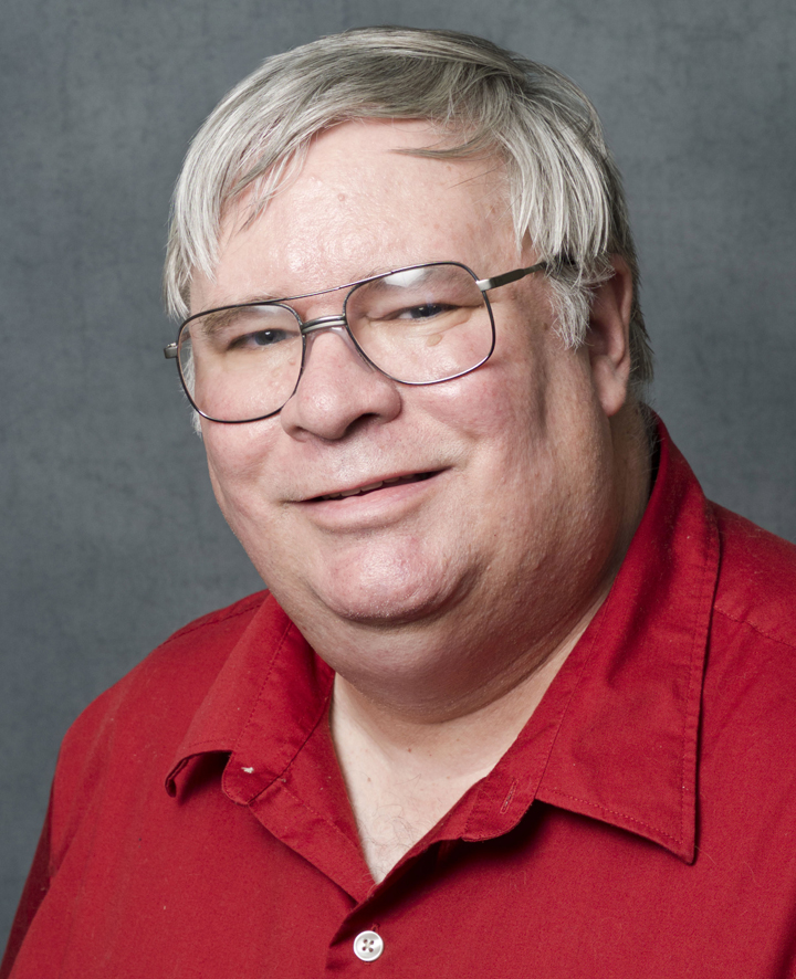This photo provided by the University of Kansas shows professor David Guth , who has been placed on leave because of a tweet he published after this week's mass shooting in Washington, the university said Friday, Sept. 20, 2013.