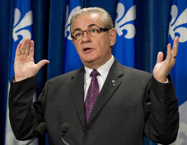 Coalition Avenir Quebec legislature member Jacques Duchesneau comments on former Parti Quebecois minister Andre Boisclair, Wednesday, September 25, 2013 at the legislature in Quebec City. 