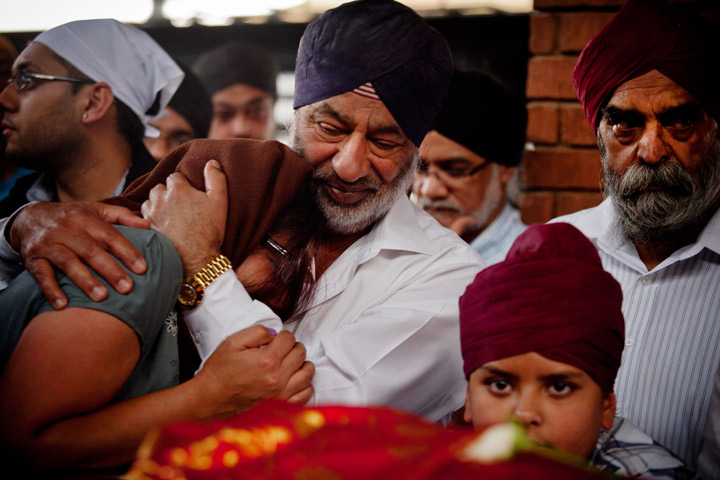 Mourners gather at the Sikh funeral of Dalvinder Kaur Ghataurhae and her grandson Pavraj Singh Ghataurhae, 16, at the Hindi Crematorium in Nairobi on September 25, 2013, after they were killed in the attack on Nairobi’s Westgate shopping mall. (Photo credit: Getty Images)