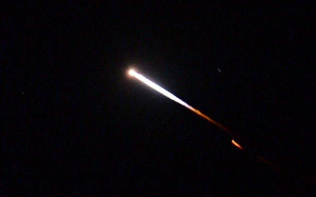 An unmanned Minotaur rocket carries NASA’s LADEE spacecraft after launching to the moon from Virginia’s Eastern Shore on Friday, Sept. 6, 2013.