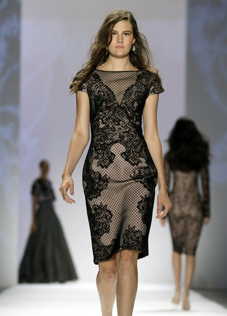 The Tadashi Shoji Spring 2014 collection is modeled during Fashion Week in New York, Thursday, Sept. 5, 2013. (AP Photo/Richard Drew)