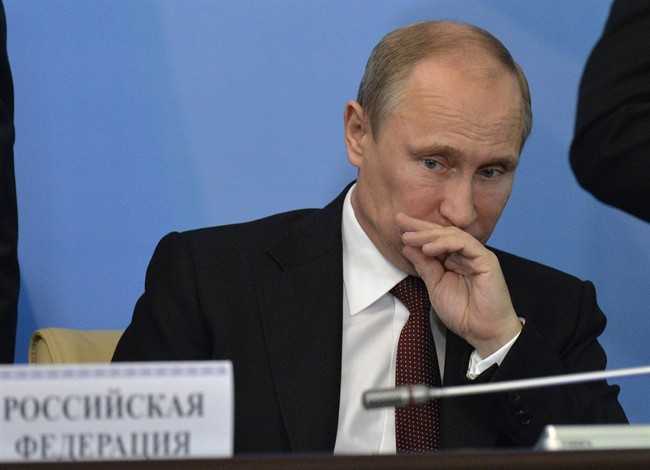 Russian President Vladimir Putin attends the Shanghai Cooperation Organization summit in Bishkek, Kyrgyzstan, Friday, Sept. 13, 2013. 