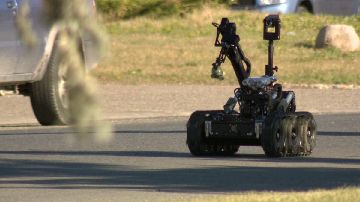 Police sent the bomb squad to the parking lot where they found the grenade which turned out to be a paintball grenade.