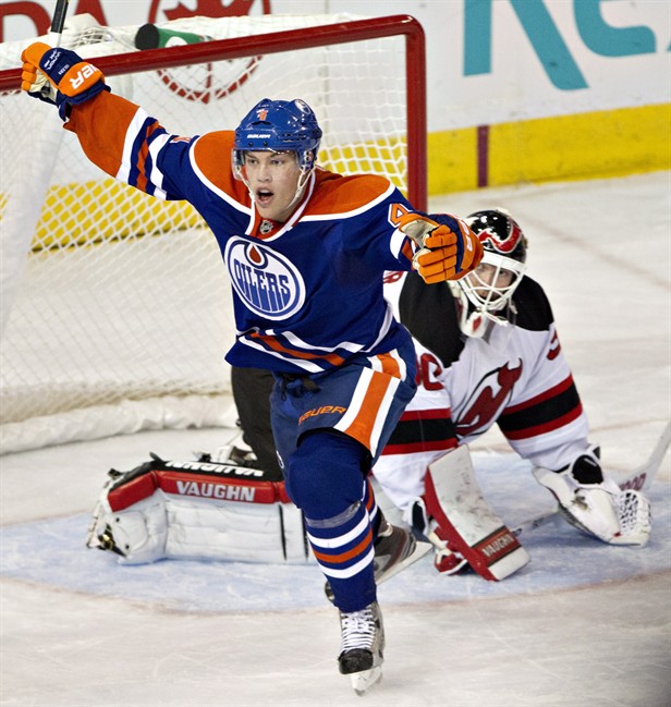 Oilers rally for first win of season - image