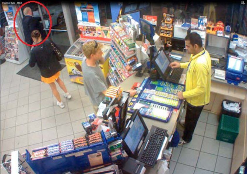 Police surveillance of Ford and Lisi with packages at a Scarlett Road gas station - image