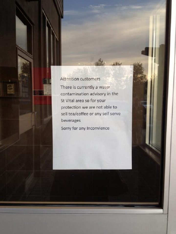 A notice at a St. Vital McDonalds advises customers that some beverages aren’t available because of the boil water advisory.