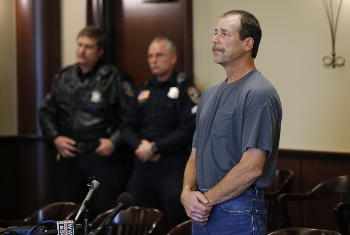 Theodore P. Wafer, 54, of Dearborn Heights, appears at his arraignment in 20th District Court in Deaborn Heights, Mich., Friday, Nov. 15, 2013. Wafer faces second-degree murder and manslaughter charges in the death of 19-year-old Renisha McBride.  (AP Photo/Paul Sancya).