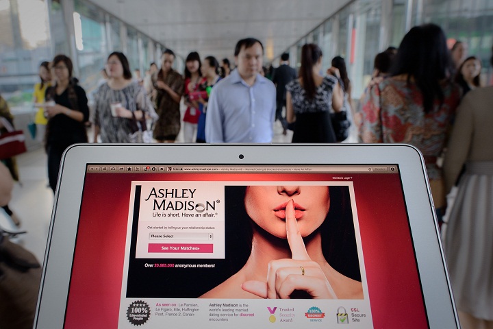 The homepage of the Ashley Madison dating website displayed on a laptop in Hong Kong. 