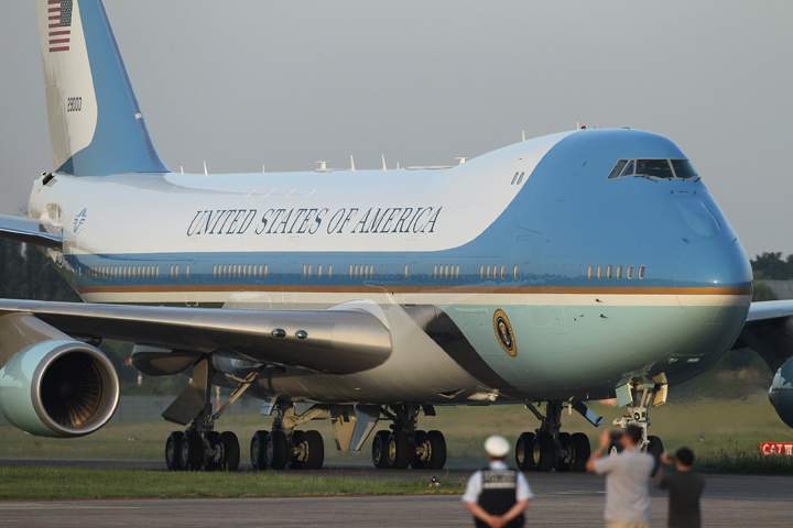 Air Force One, carrying U.S. President Barack Obama.