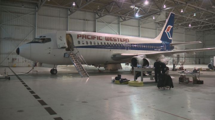 Crews work to inspect the Boeing 737 at the Alberta Aviation Museum Thursday, November 28, 2013.